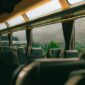 Sebuah kereta wisata melintas di jalur perbukitan yang menyajikan pemandangan alam hijau, menjadi salah satu alternatif akses pilihan favorit pelancong menuju destinasi liburan.