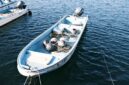 Deretan rumah perahu kayu tradisional Funaya berdiri anggun mengapung di sepanjang perairan Teluk Ine, Kyoto utara.